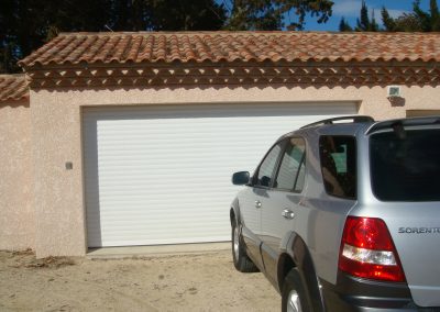 la maison du store, entrée de garage